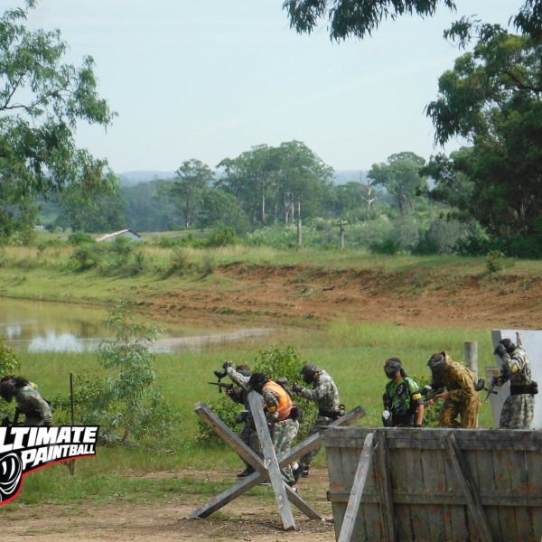 View of the lake and green bushland at Ultimate Paintball Battlefield