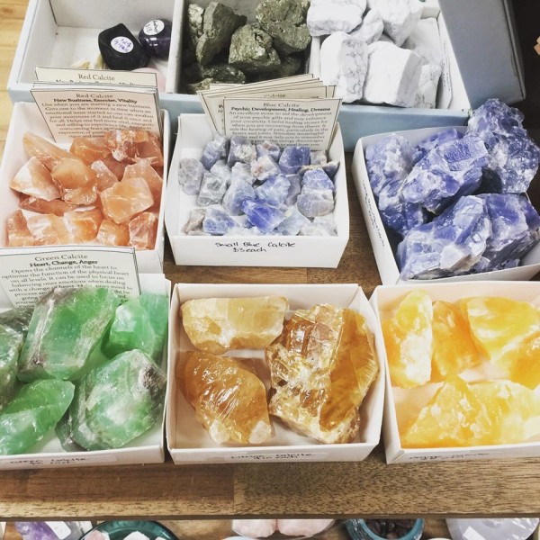 Forest of Wisdom coloured crystals with labels describing properties