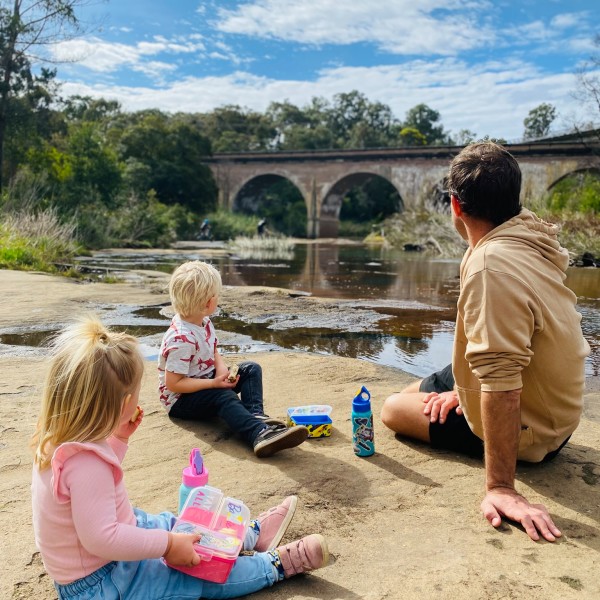 Kids enjoying lunch at Bargo River with their Dad
