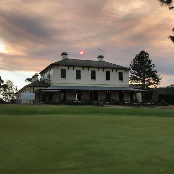 View of Antill Park House from the golf course at dusk