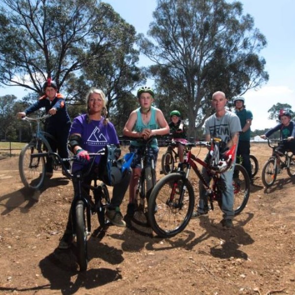 Group of BMX bike riders at DNA Dirt Park