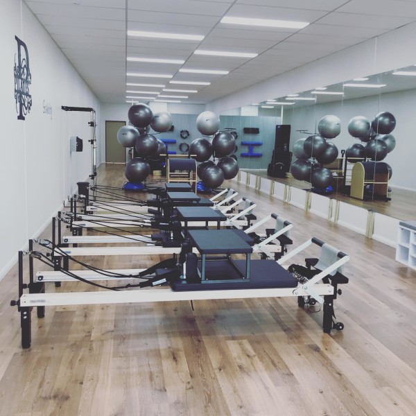 Reformer Pilates class with equipment ready to go