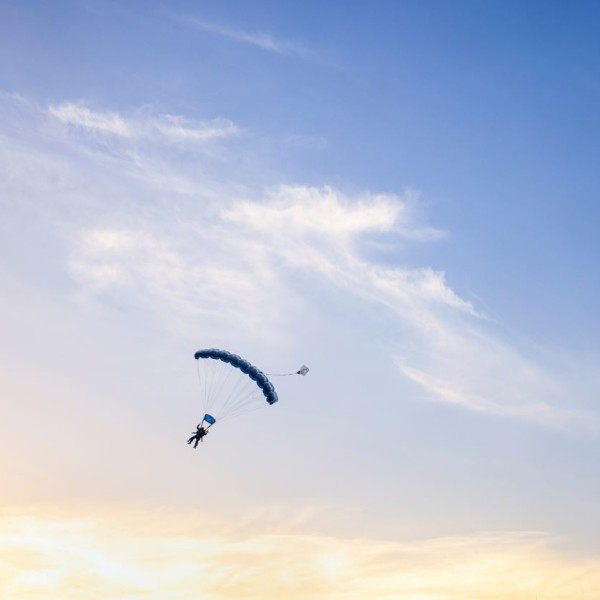 Skydivers in the air above Wollondilly. Image Credit - Destination NSW