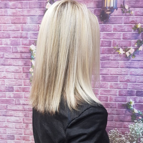 Lady with blonde hair done at Hairbomb Bargo 