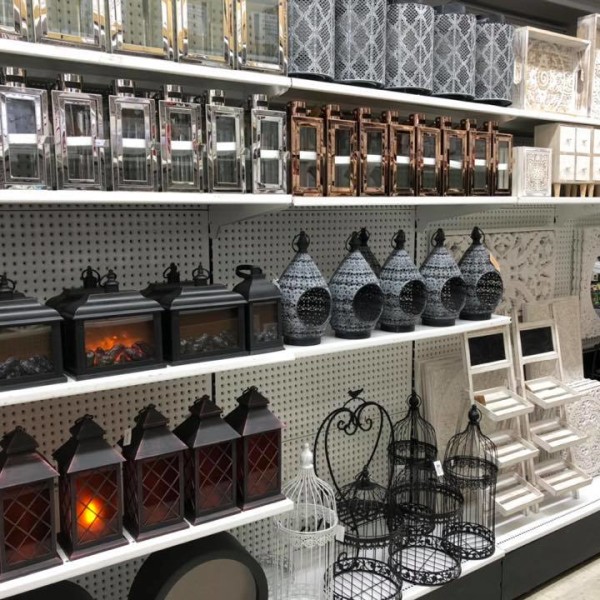 House Warehouse shelves with lanterns and decorative items for sale