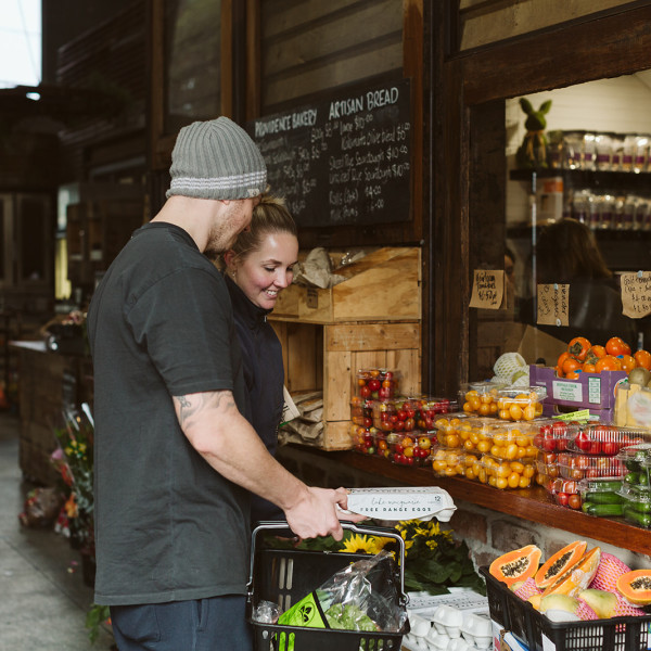 Couple shopping for groceries at Pheasants Nest Produce