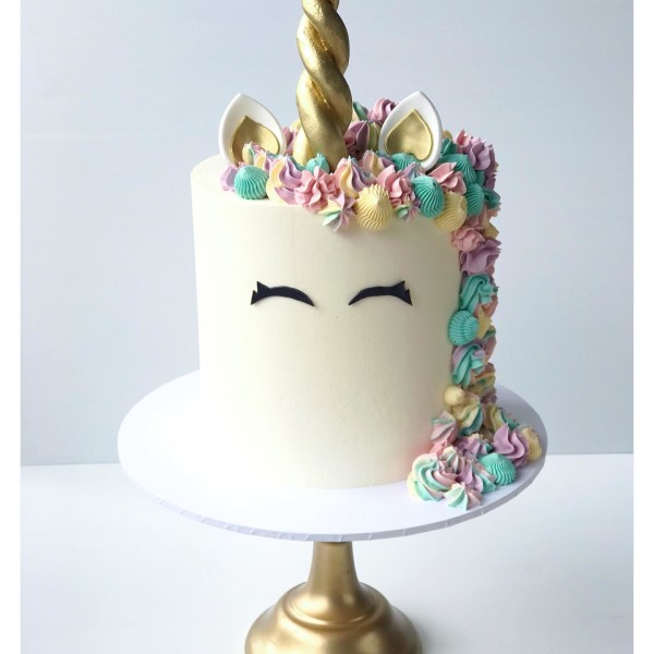 Unicorn cake with colourful decorations 