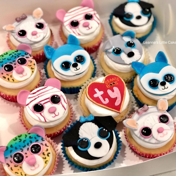 Iced cupcakes with TY Toy animal faces